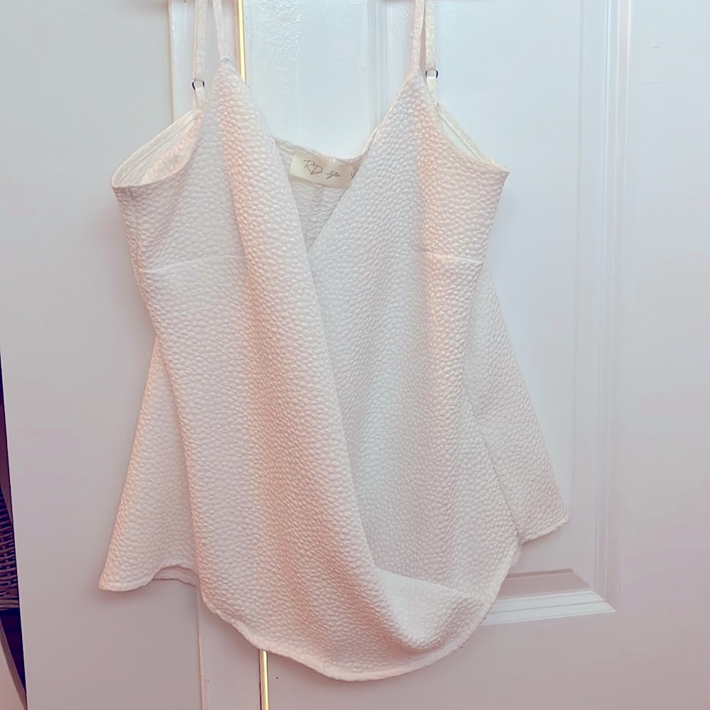 white textured top. Size small.